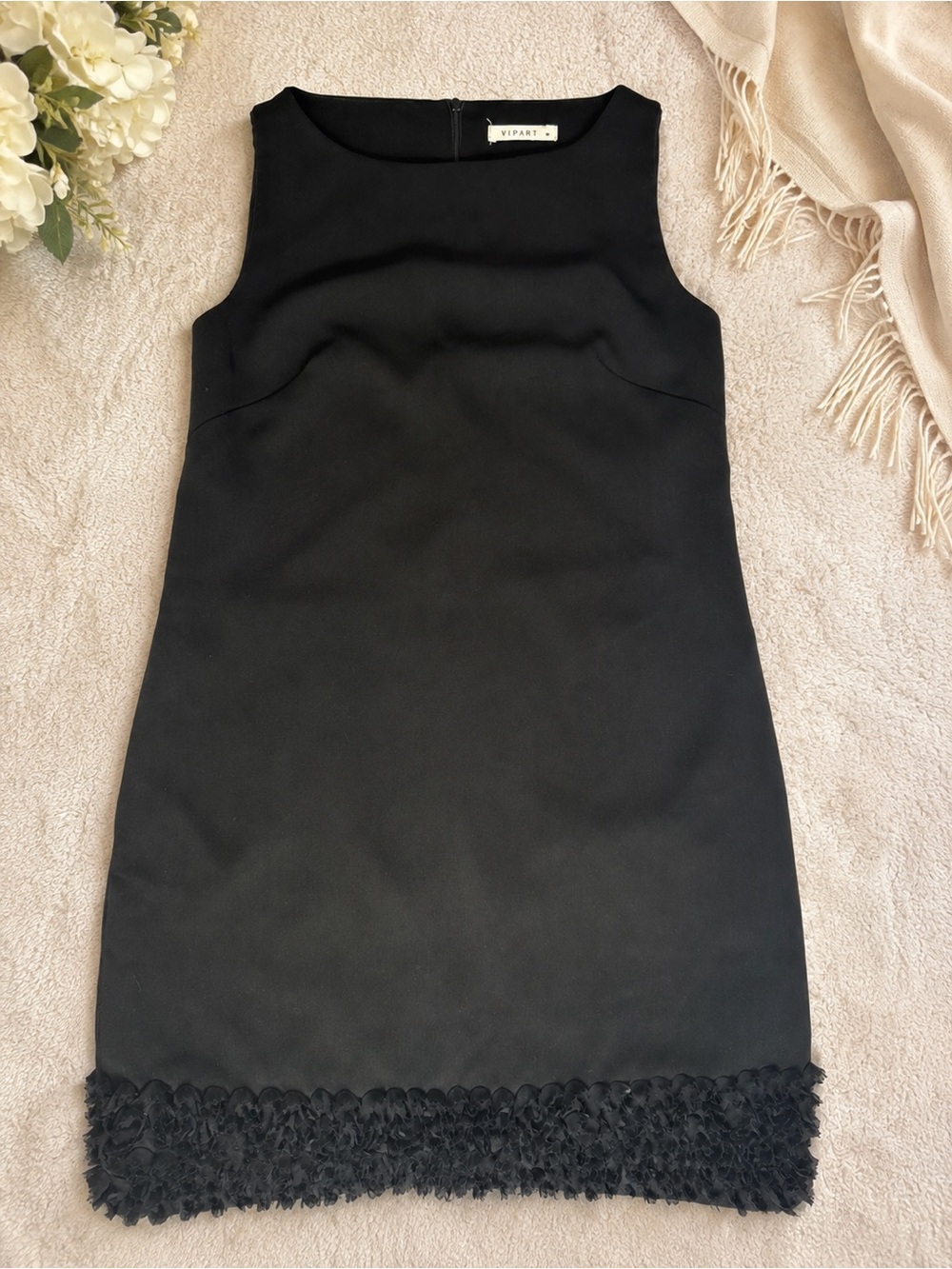 Sleeveless Black Mini Dress with Textured Hem